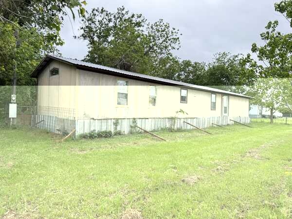 Brookshire TX mobile home exterior side view