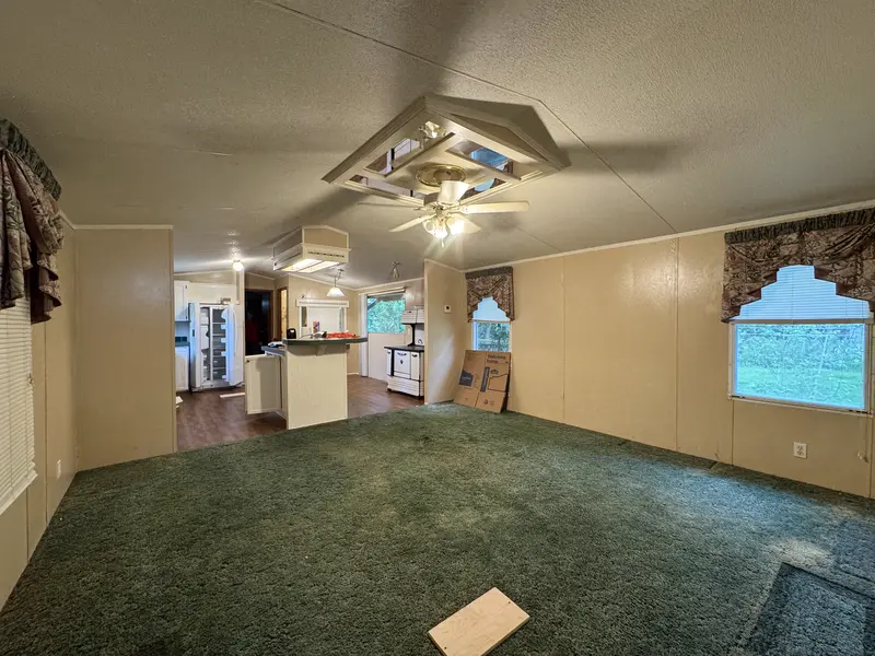 Brookshire TX mobile home living room panoramic into kitchen