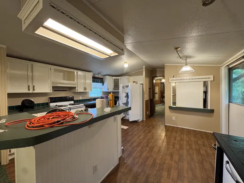 Kitchen counter and open layout to dining area